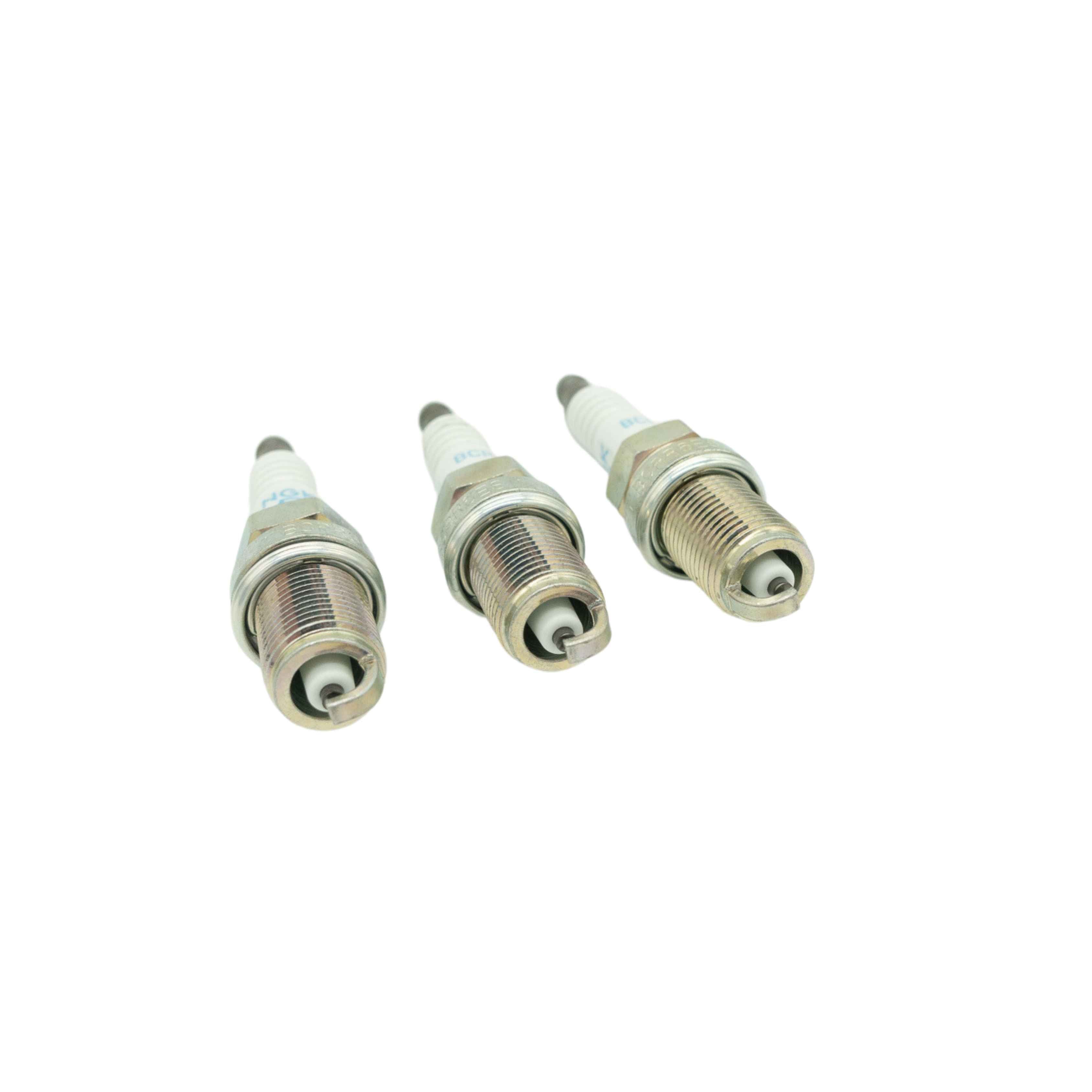 Close-up of three spark plugs for Honda Acty Van HH3 HH4 1990-1999 models isolated on white background, showing high-quality electrode and threading detail for efficient ignition
