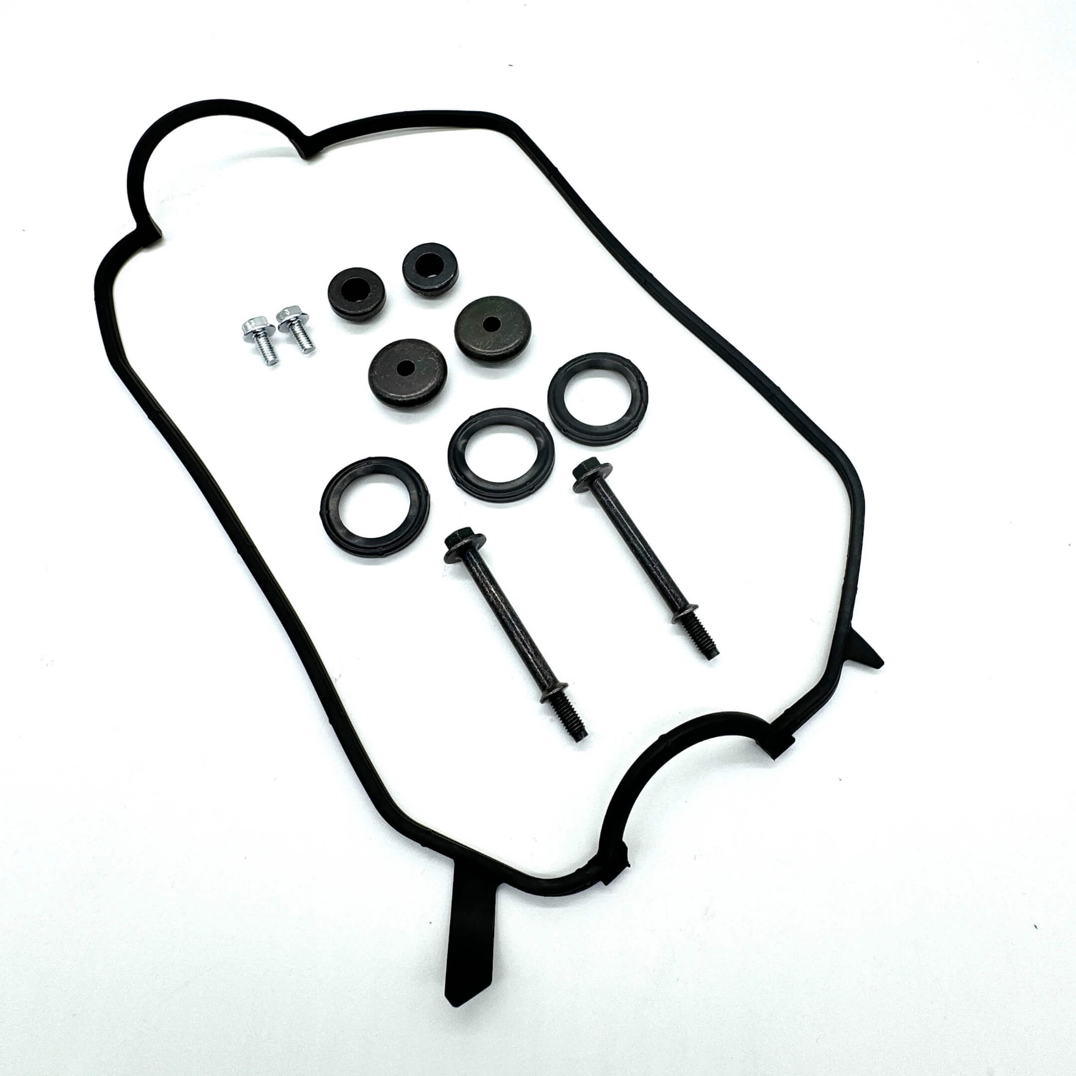 Valve Cover Gaskets & Bolts Complete Kit featuring black rubber gaskets, bolts, and washers, ideal for engine sealing.