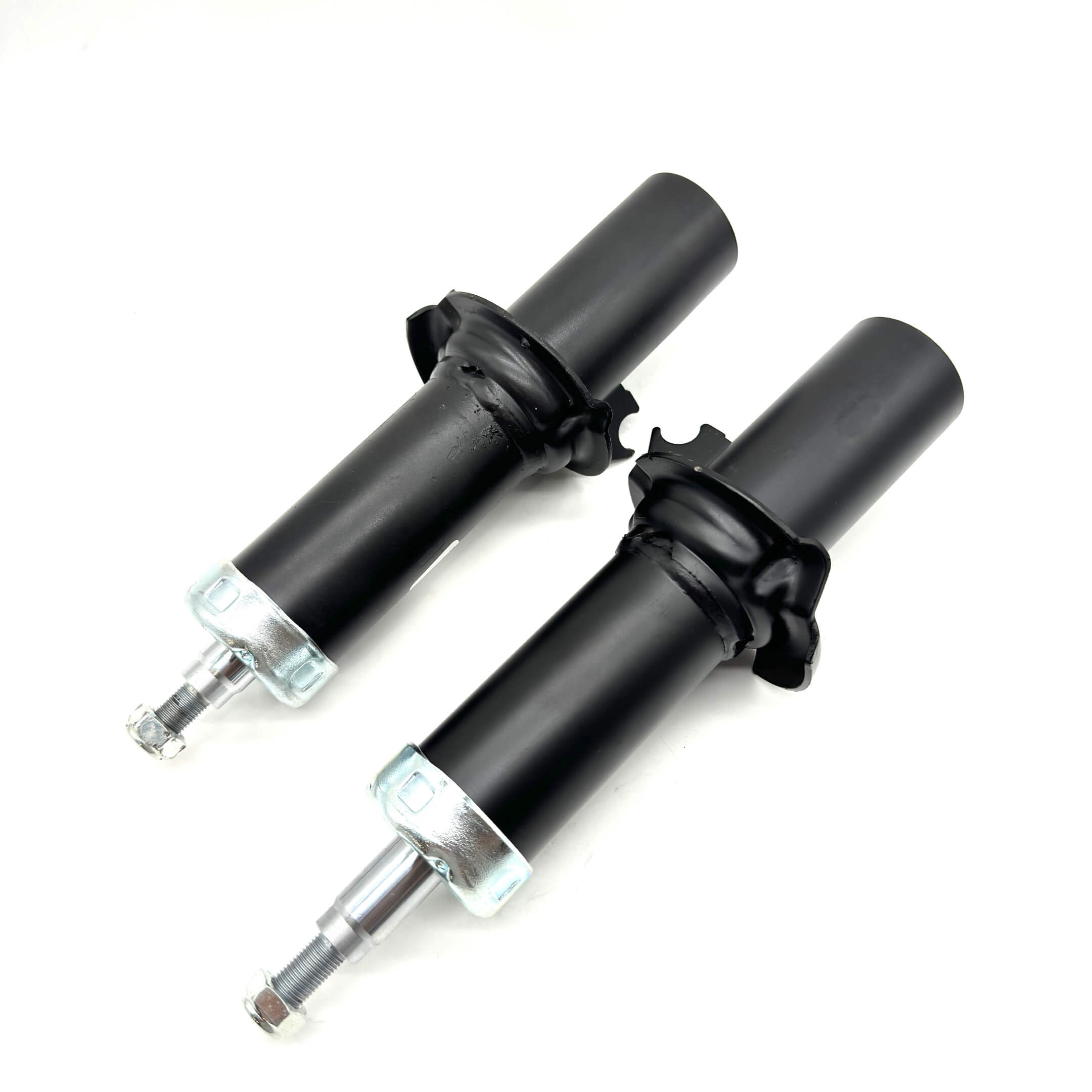 Pair of front struts for Honda Acty, HH3, HH4, 1990-1999, aligned side by side, ready for installation to enhance vehicle stability.