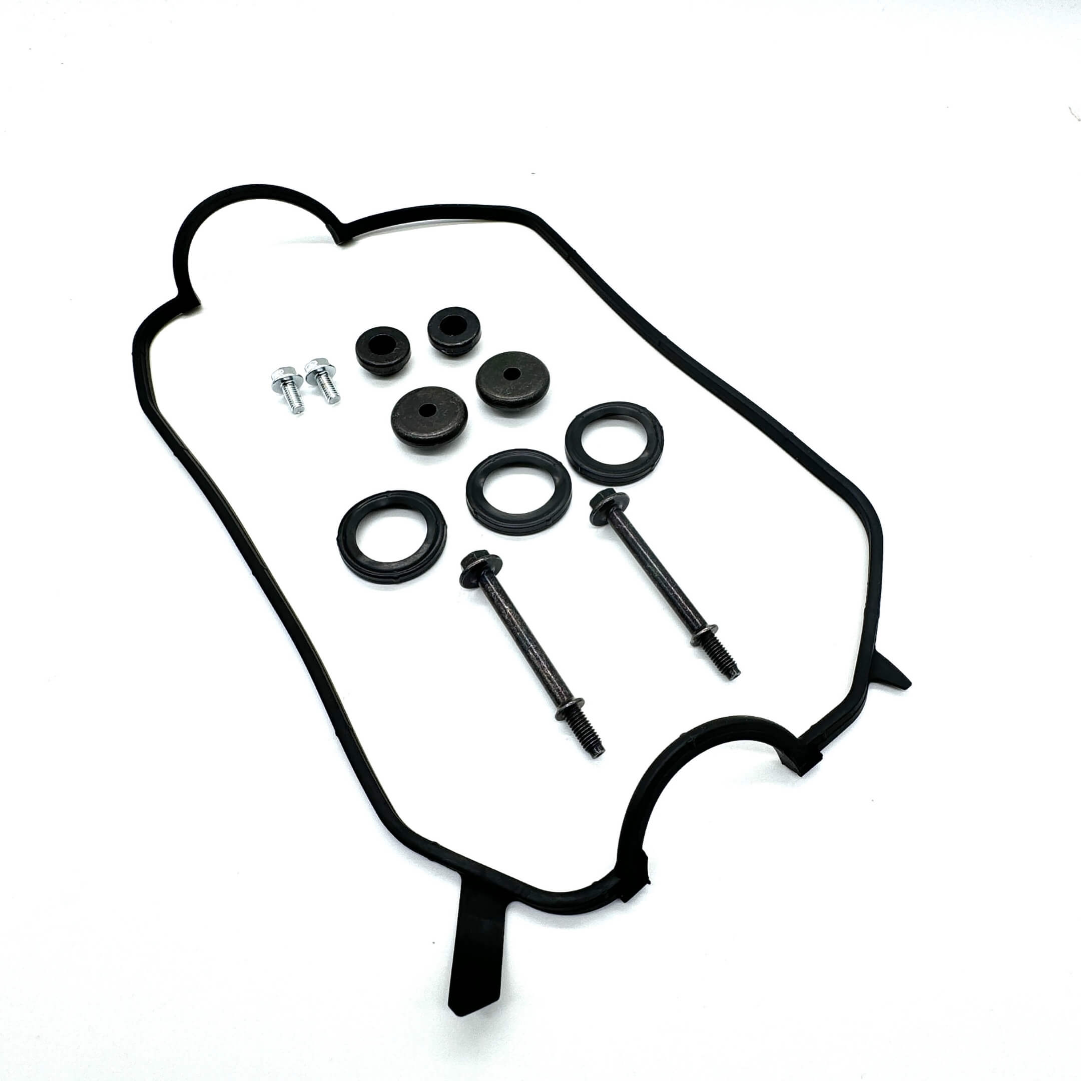 Valve Cover Gaskets & Bolts Complete Kit featuring black rubber gaskets and metal bolts, ideal for engine maintenance and repair.