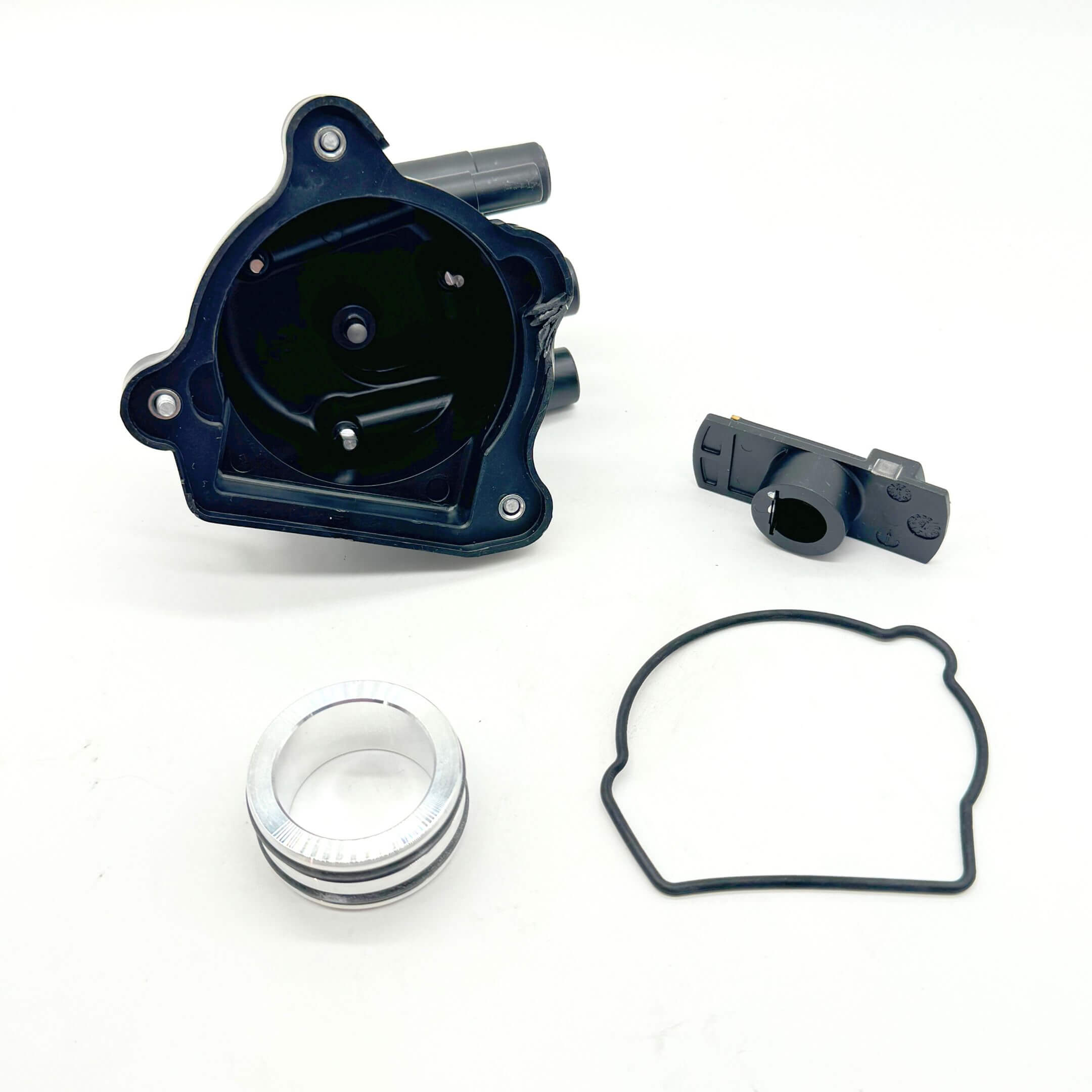 Rear view of the Honda Acty distributor rebuild kit featuring the inside of the distributor cap and the replacement rotor.