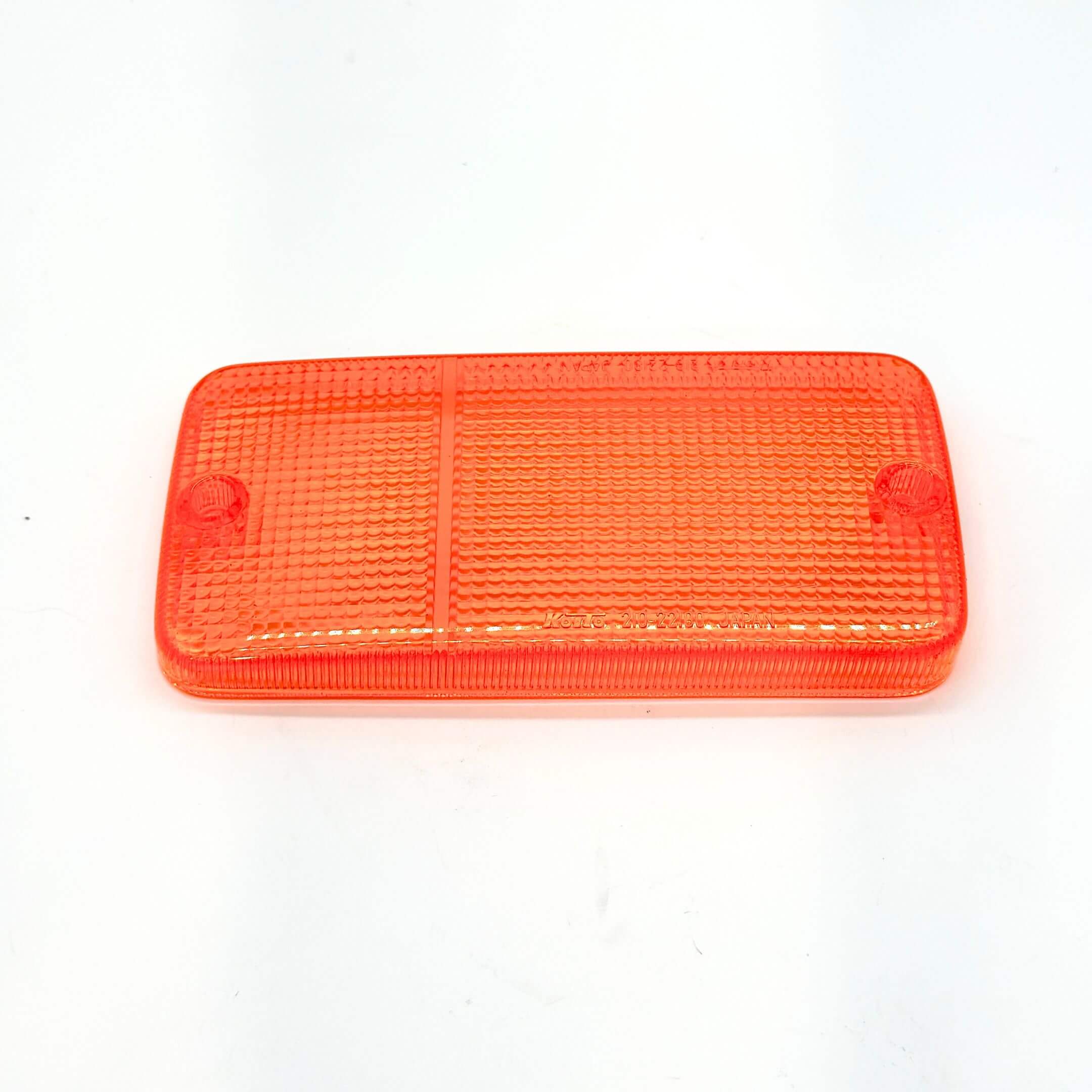 Close-up view of the right-side front bumper light lens cover in orange, compatible with Honda Acty Van HH1, HH2, HH3, HH4 models (1988-1999), showcasing its durable construction.