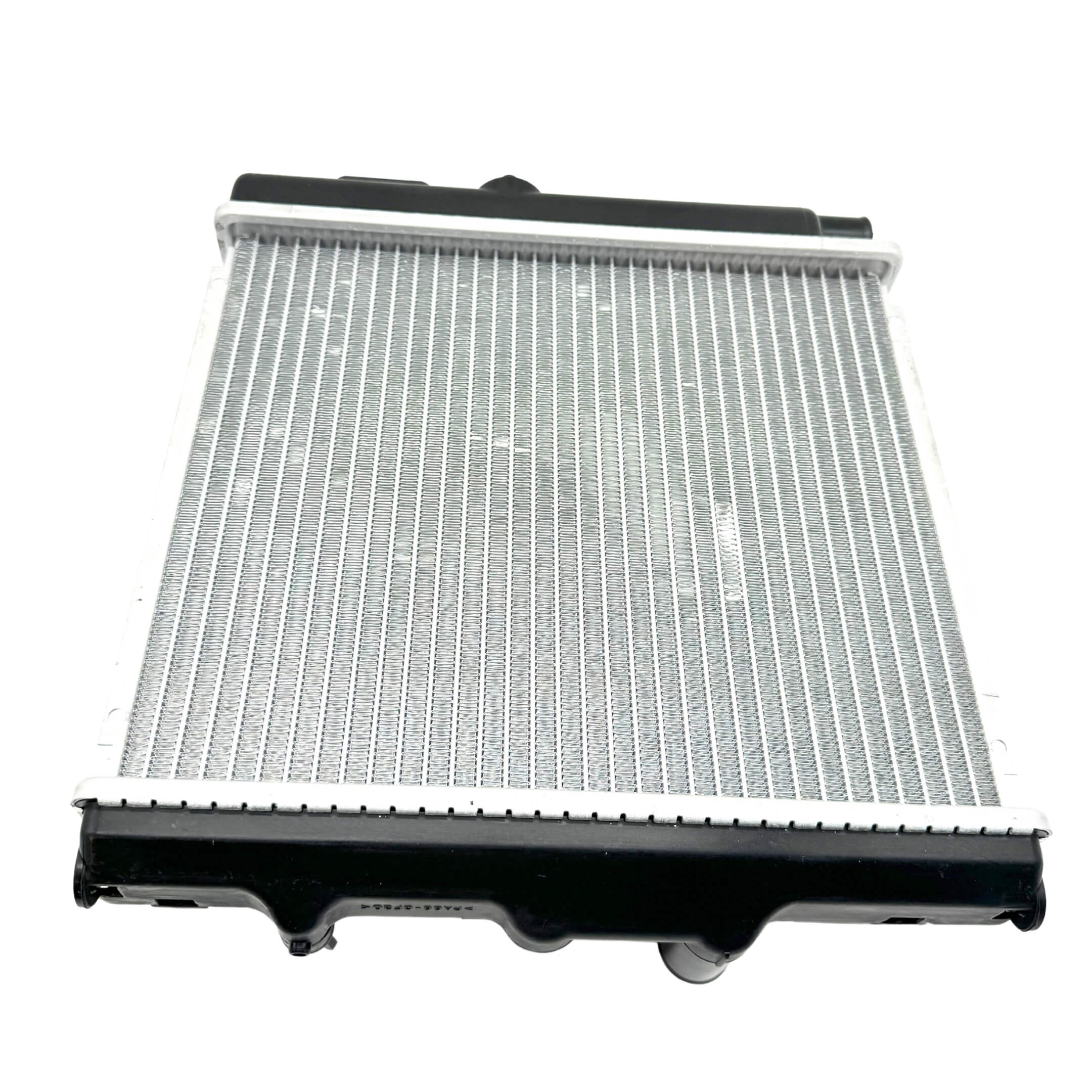 Top down view of a lightly used radiator for Honda Acty HH3, HH4, emphasizing the well-preserved core and cap details.