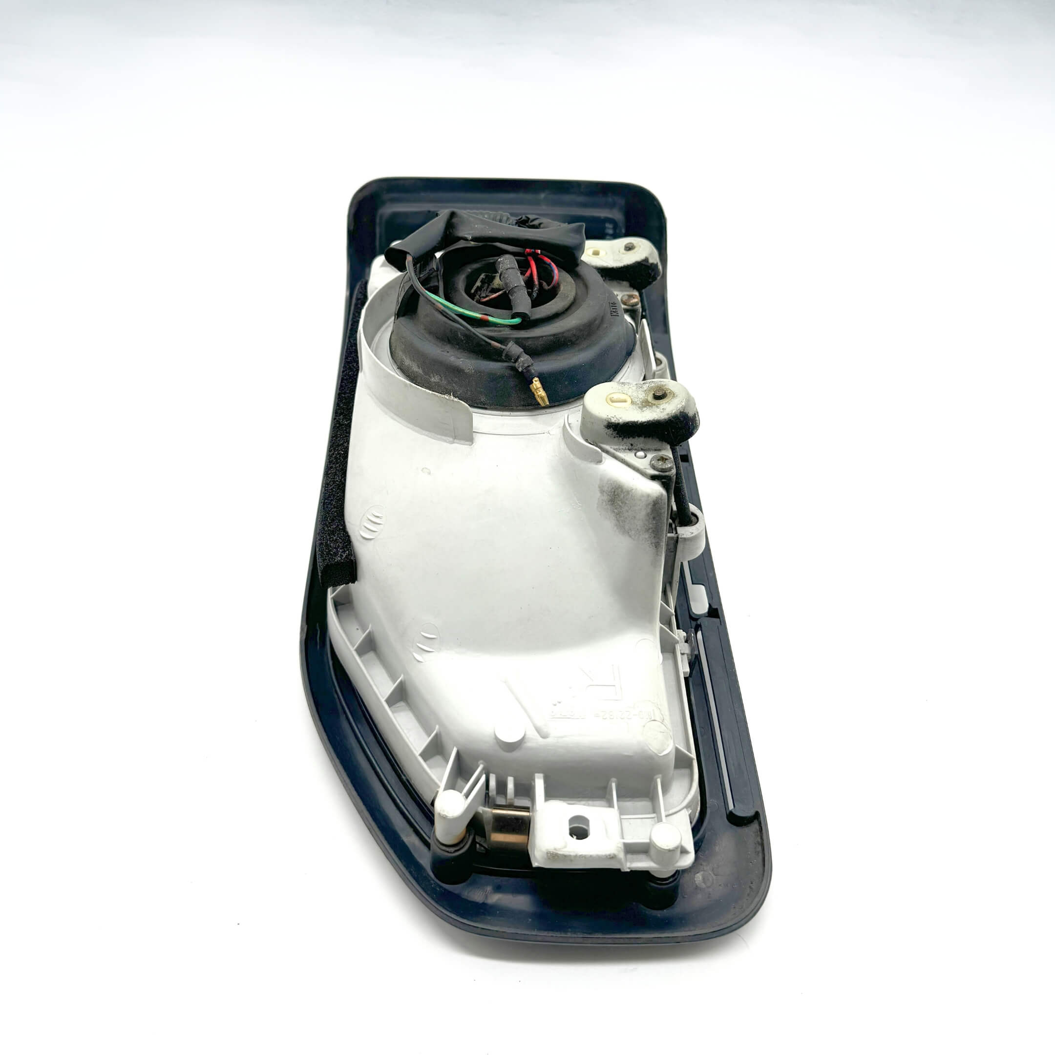 Top view of right headlight assembly for Honda Acty Van HH3, HH4 models 1990-1993 showing mounting points.