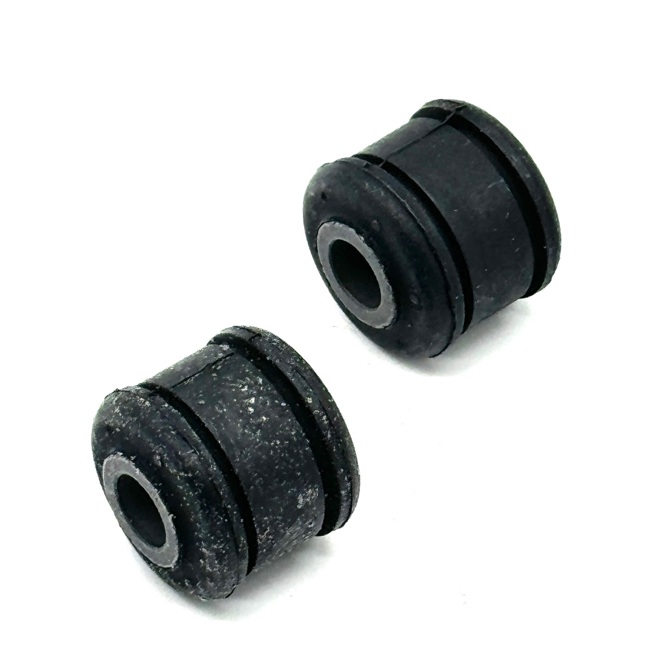 Black rear shock bushing for Honda Acty Truck HA8, HA9 models (2009-2022), featuring durable rubber construction.