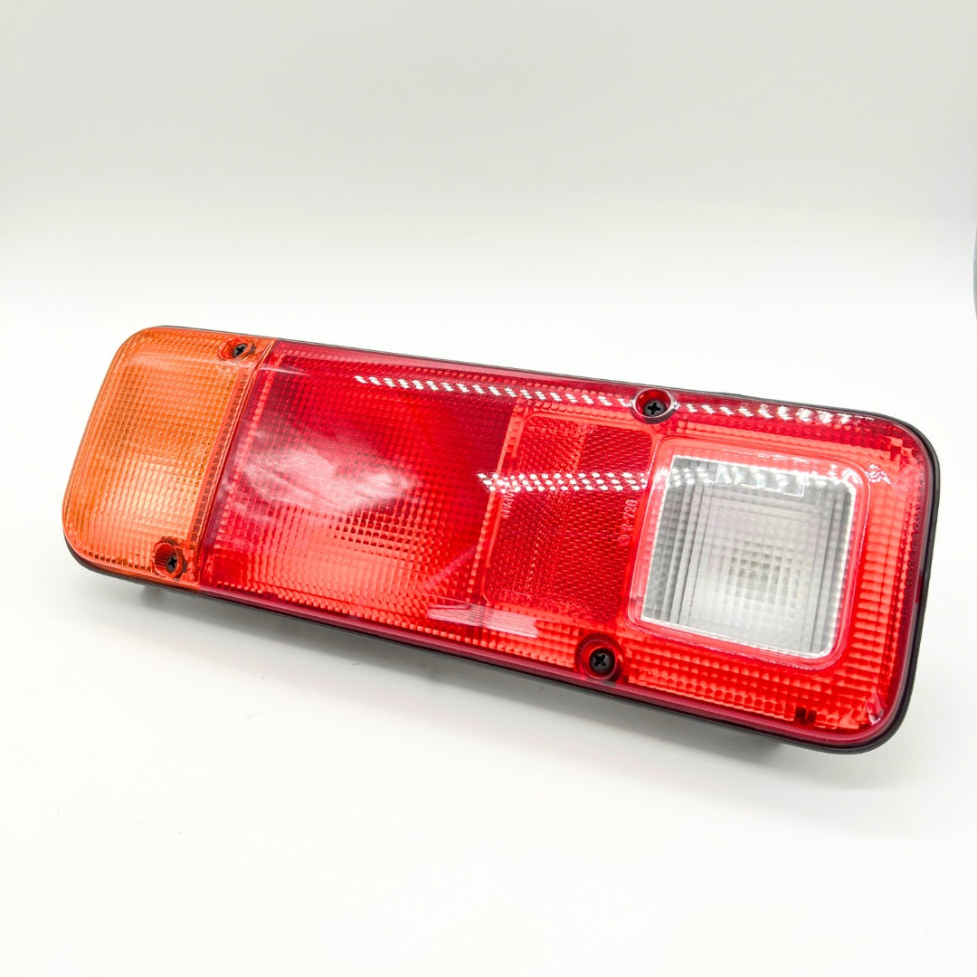 Front view of full tail light assembly kit for left side of Honda Acty Truck HA3, HA4 models (1990-1999) - red and amber lenses for optimal visibility