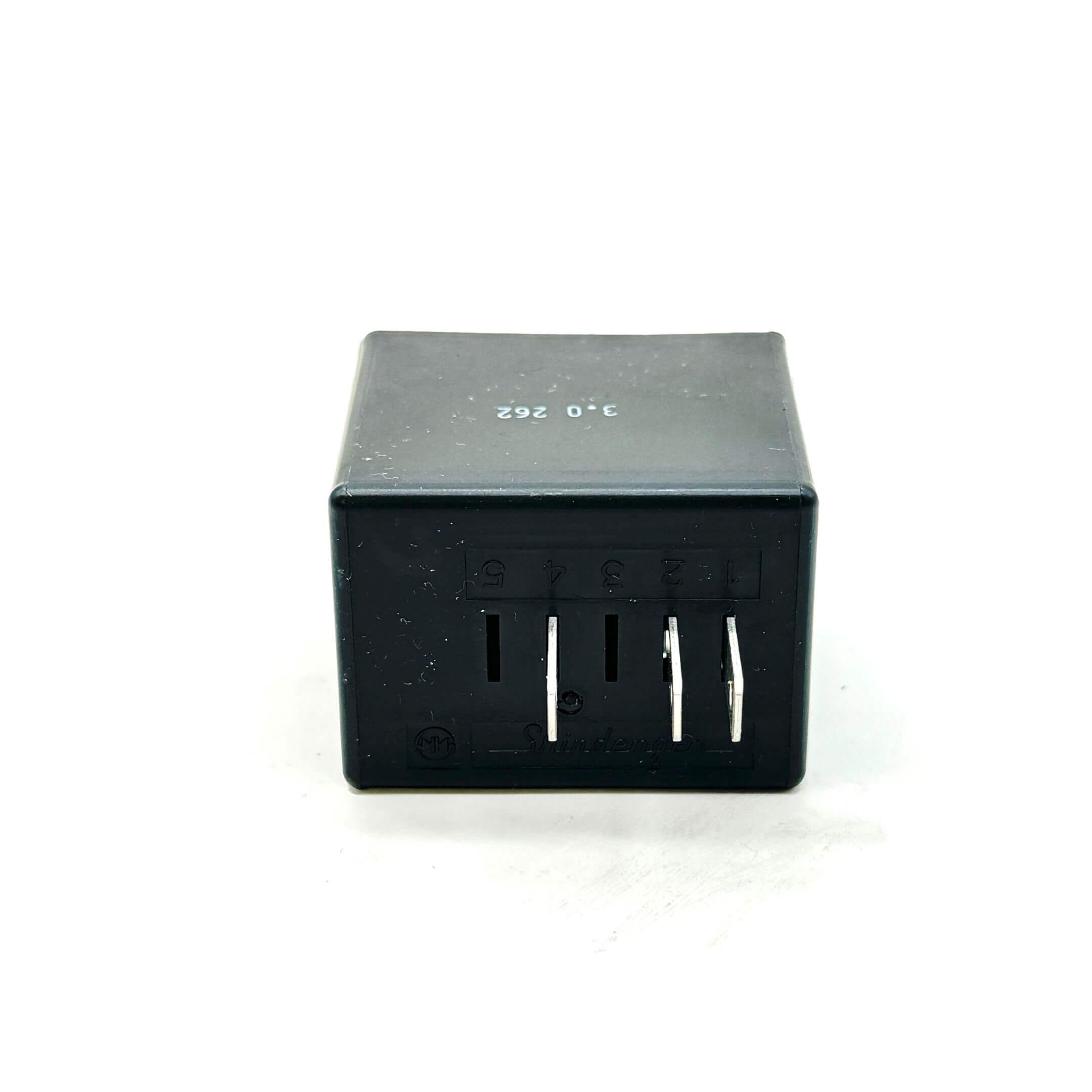 Close-up of a black fuel cut relay for Honda Acty HA3, HA4 models with numbered slots for wiring connections.