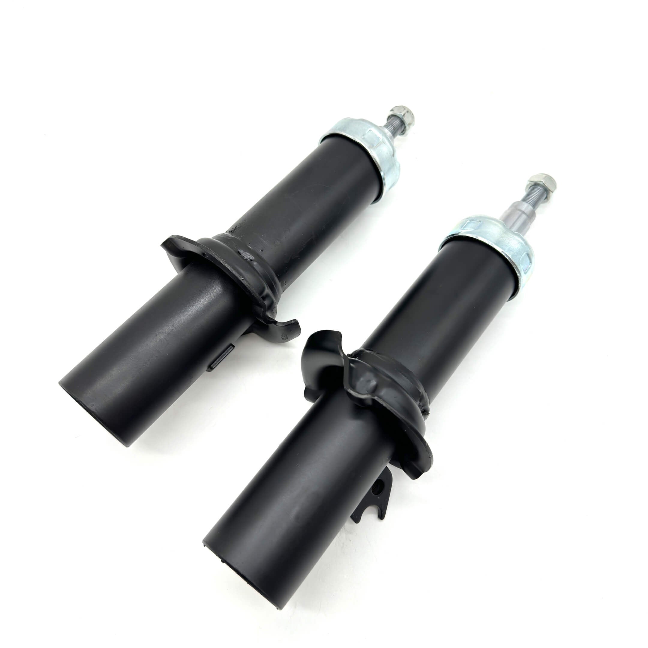 Detailed view of top and bottom of Honda Acty front struts, highlighting the precision engineering for HH3, HH4 models from 1990-1999.