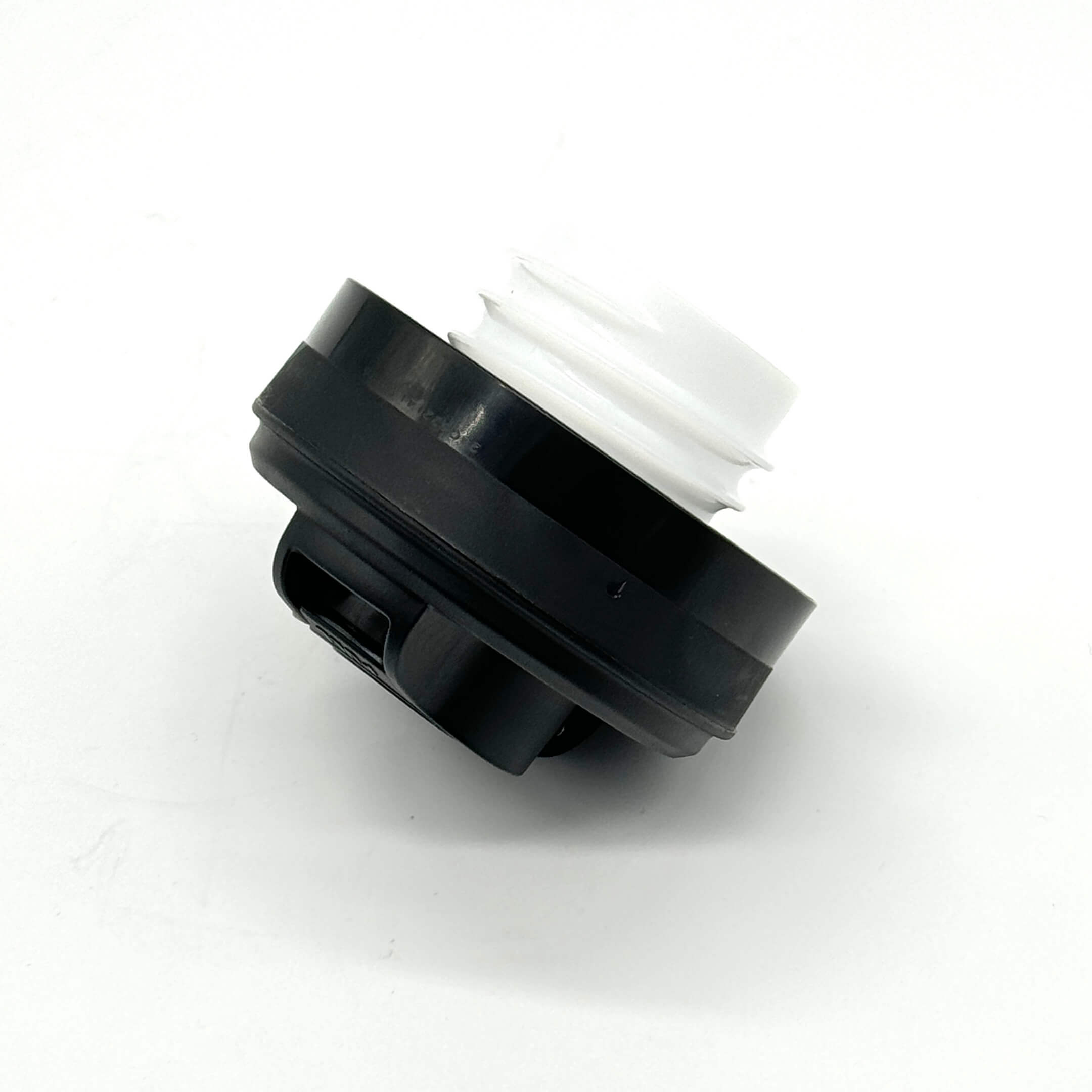 Black and white fuel cap for Honda Acty Truck HA8, HA9 models, 2009-2022, featuring a secure locking mechanism.