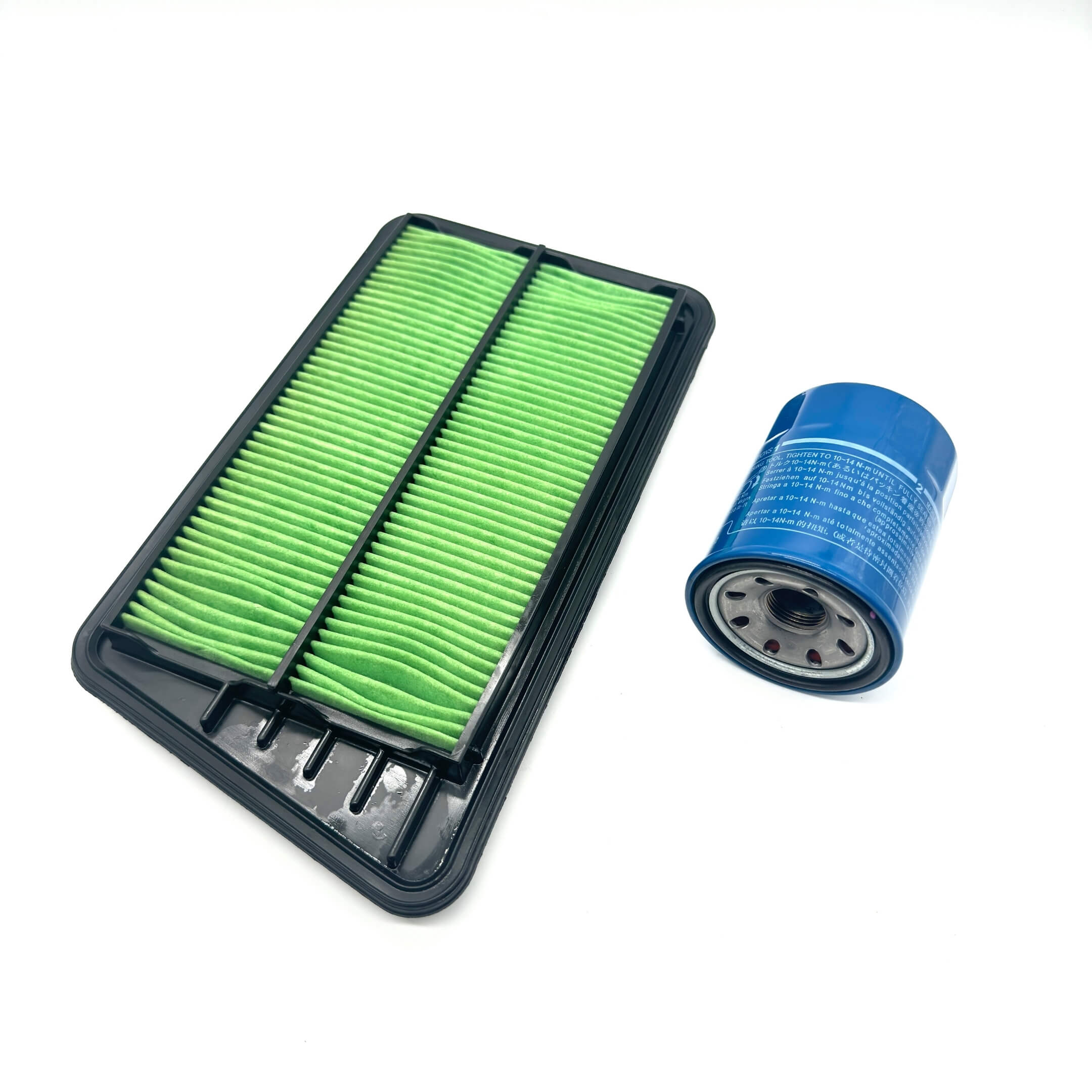 Genuine Honda 2 Piece Filter Package for Honda Acty Truck HA8, HA9 Models (2009-2022) featuring a green air filter and blue oil filter.