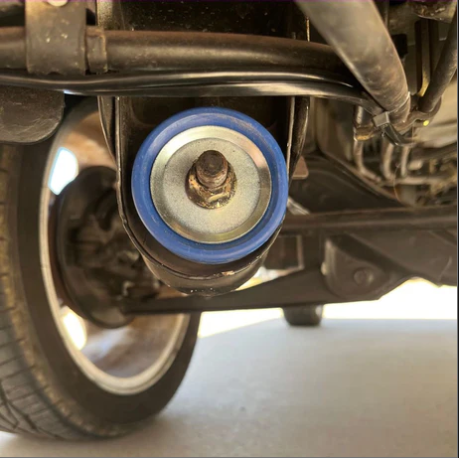 Honda Acty HA3 HA4 1990-1999 suspension bushing installed, blue polyurethane bushing upgrade shown at control arm mount with washer and nut from 10 piece kit