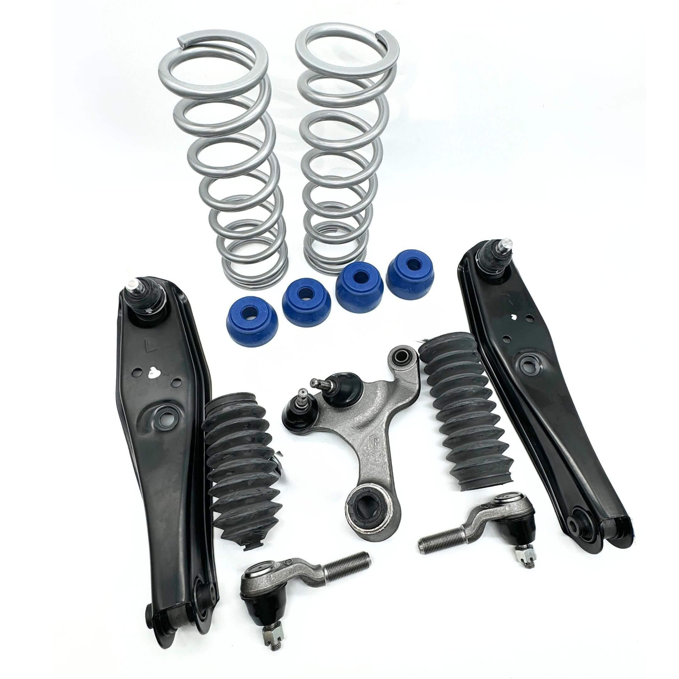 Honda Acty HA3 HA4 1990-1999 steering suspension upgrade kit with lowering springs, front lower control arms, center link arm, tie rod ends, steering rack boots, and blue polyurethane bushings on white background