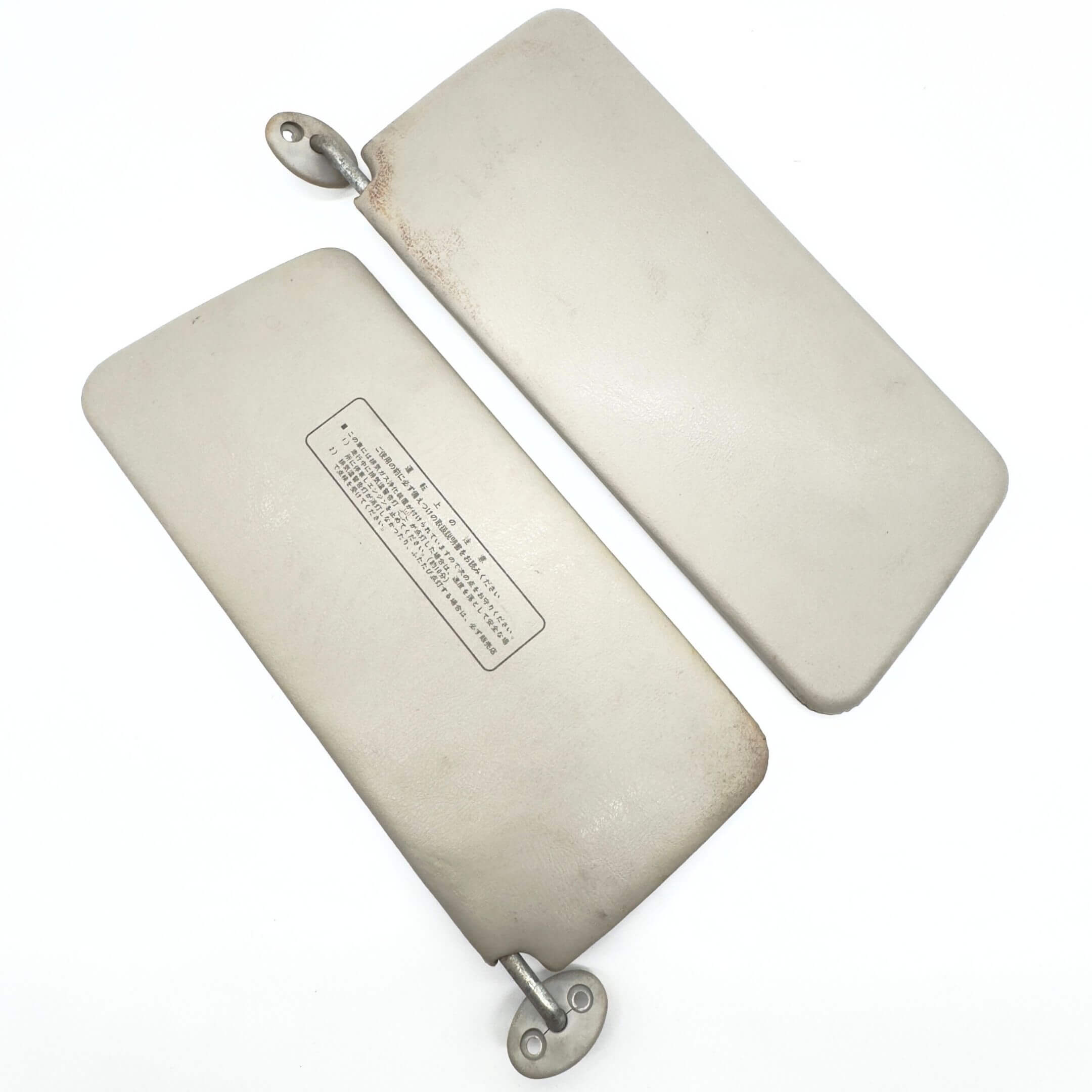 Sun Visors Set for Honda Acty Truck Models HA3, HA4 (1990-1999) featuring a used, beige finish with mounting brackets.